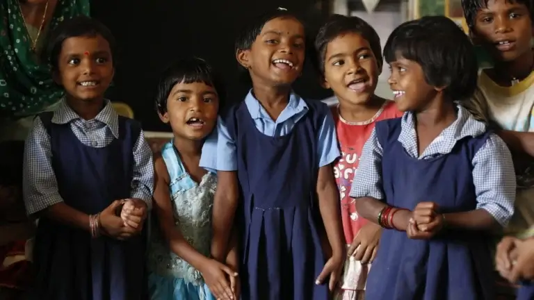 a group of children smiling