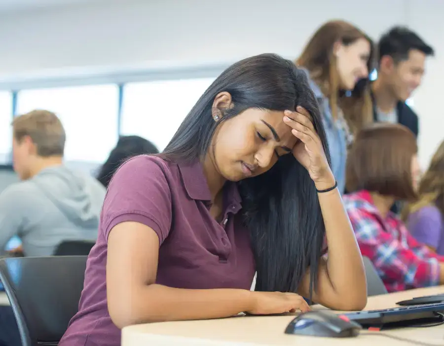 a person with her head in her hand